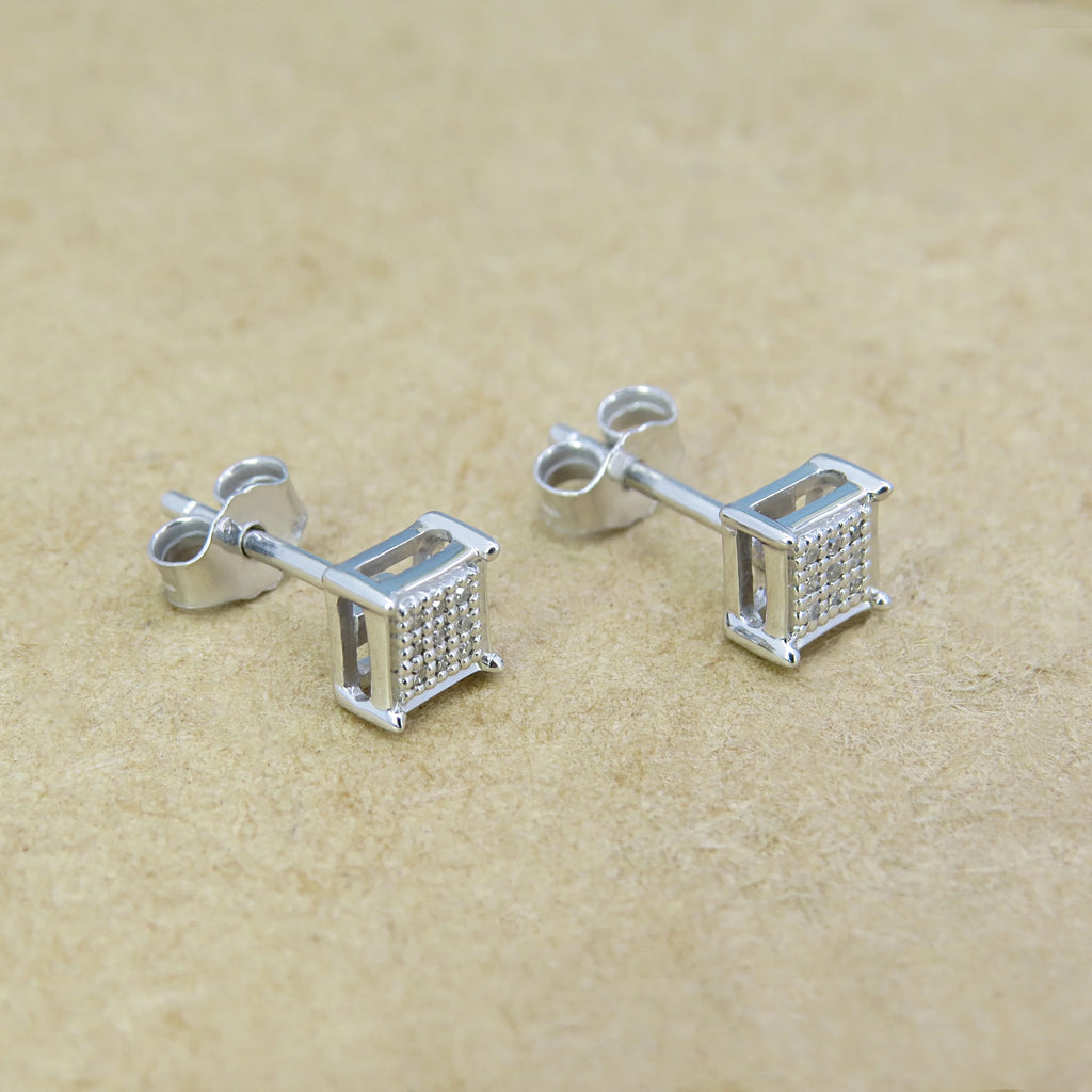 0.06 CT Round White Diamond Stud Earrings in Sterling Silver B957
