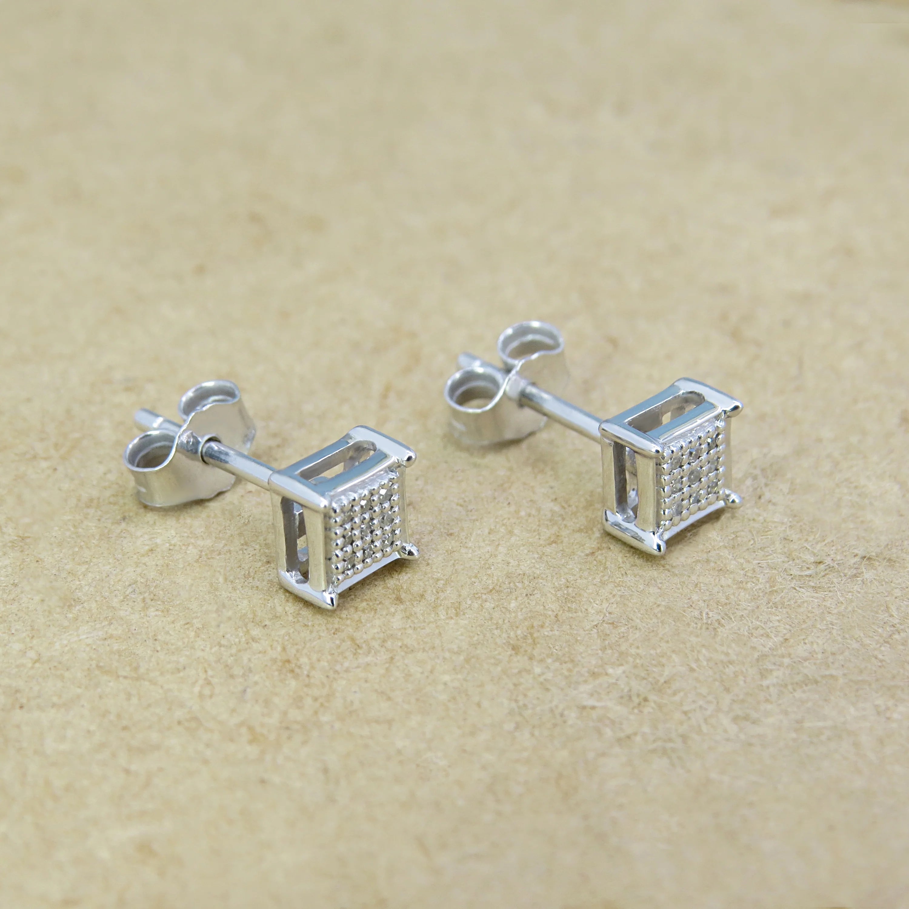 0.06 CT Round White Diamond Stud Earrings in Sterling Silver B957