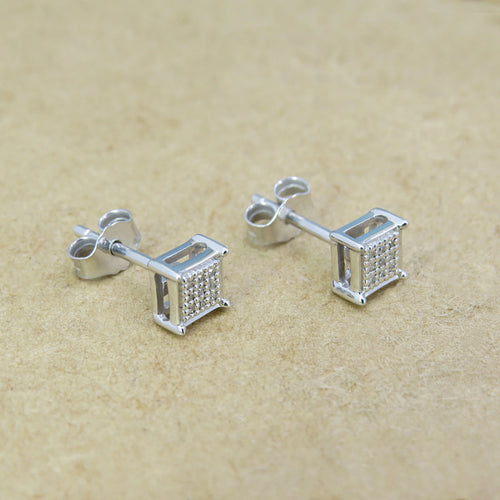 0.06 CT Round White Diamond Stud Earrings in Sterling Silver B957